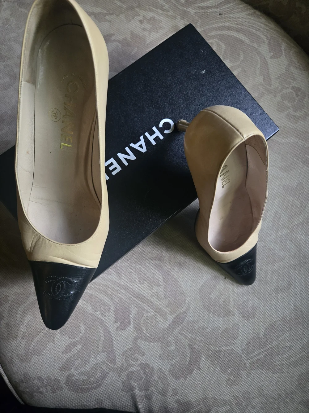 CHANEL Chic Two-Tone Beige and Black Cap-Toe Leather Pumps
